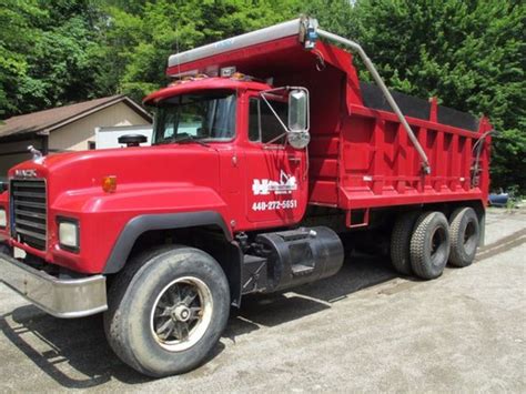 Dump trucks with a shorter wheelbase are able to maneuver around more than higher capacity dump trucks on a semi-trailer. . Dump trucks for sale ohio